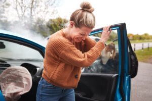 just the beginning and Female Motorist In Crash For Crash Insurance Fraud Getting Out Of Car