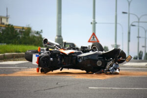 motorcycle accident in the middle of the road in Duluth, GA