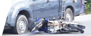 a damaged motorcycle from a car
