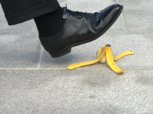 a man about to slip on a banana peel